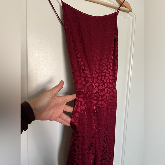 Red printed jumpsuit from Urban Outfitters Size 4. - Picture 2 of 5